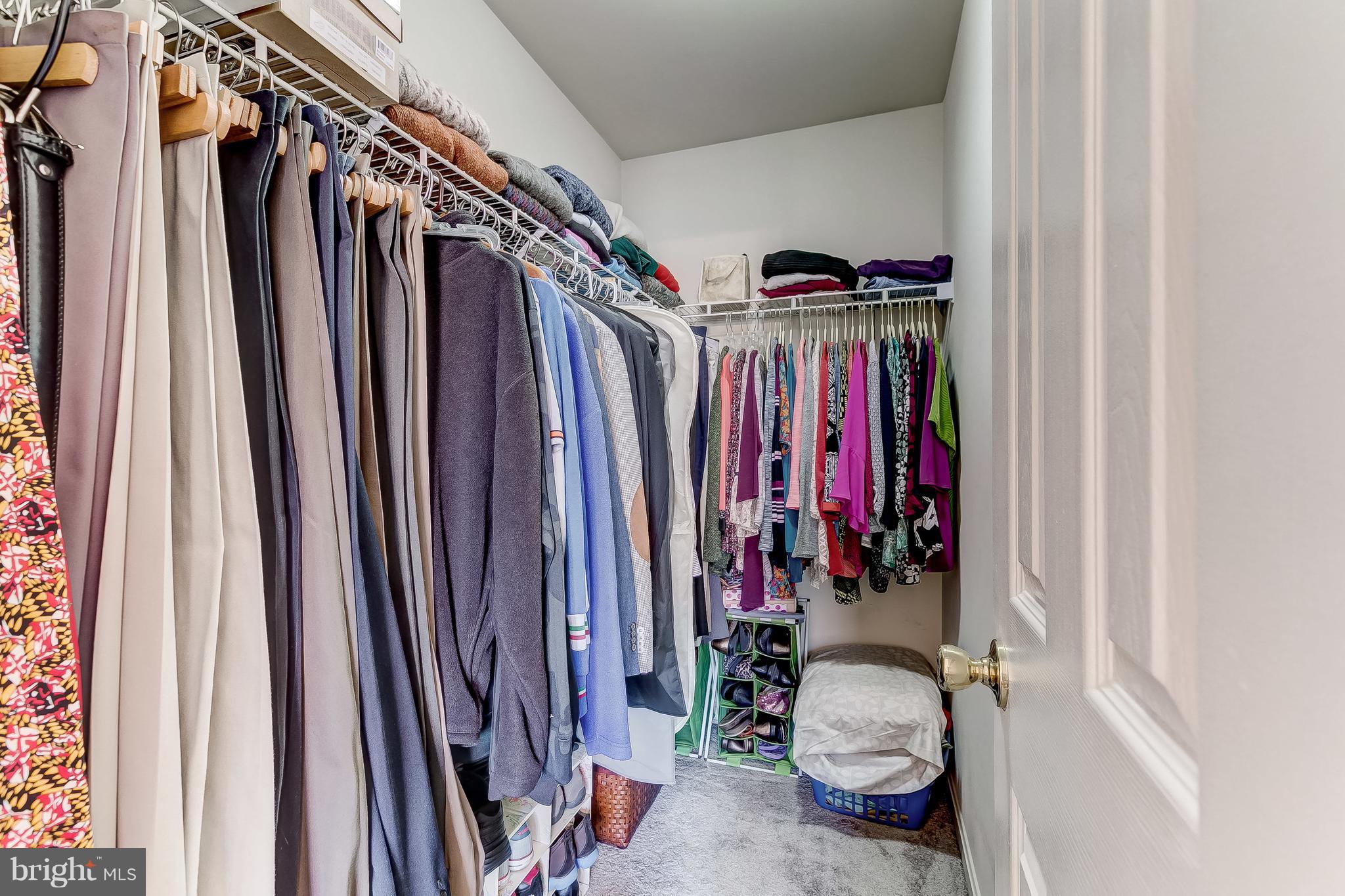 4313 Mispillion Road Baltimore, MD 21236 - Photo 24 of 38 a view of walk in closet with clothes