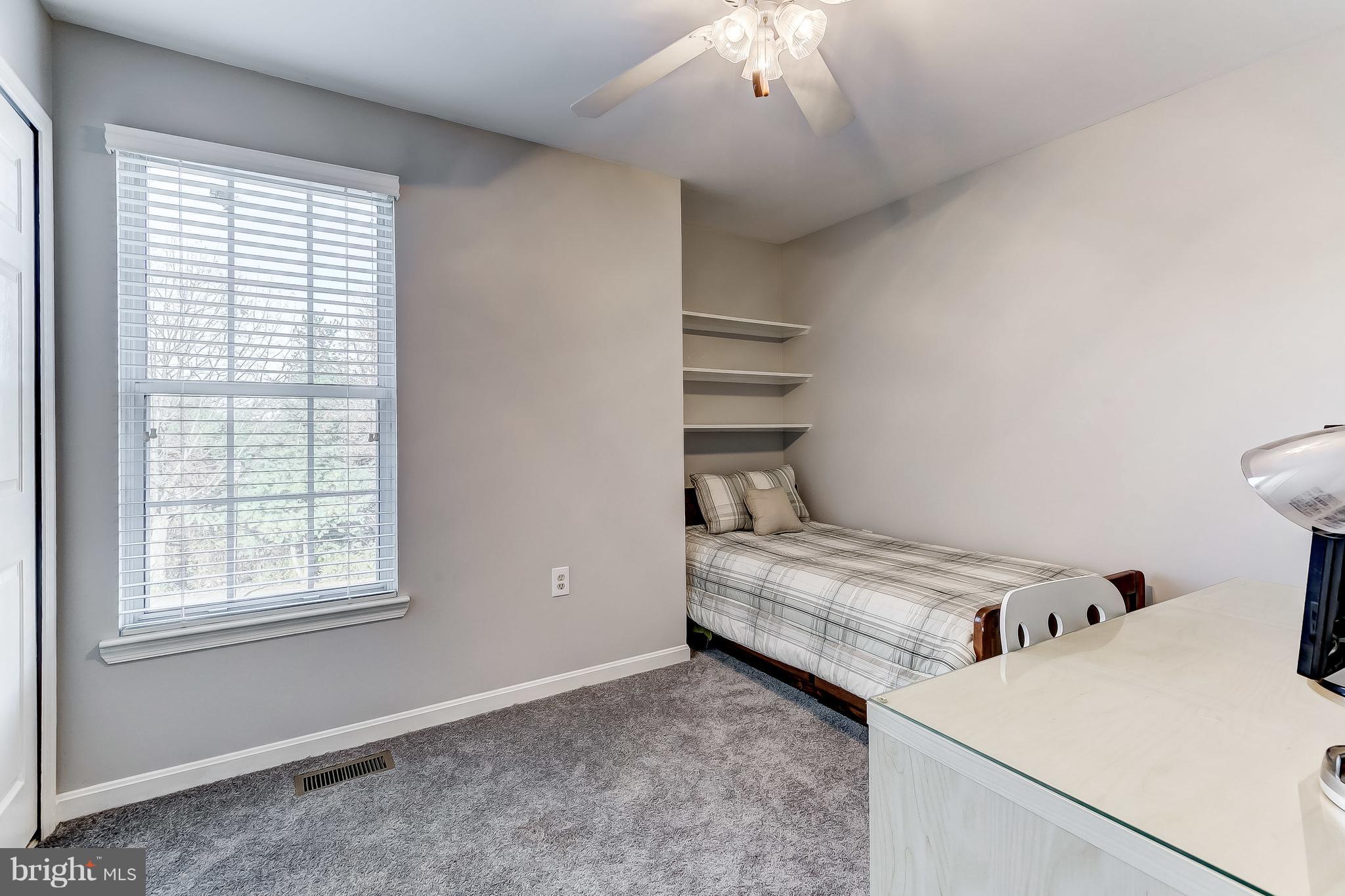 4313 Mispillion Road Baltimore, MD 21236 - Photo 25 of 38 a bedroom with a bed and a window