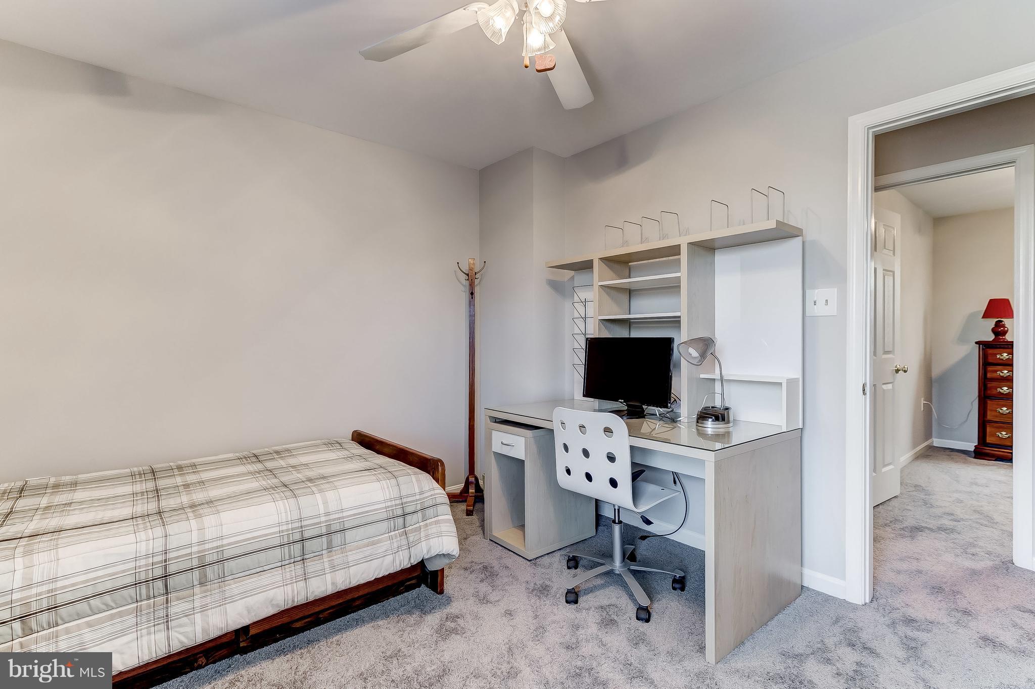 4313 Mispillion Road Baltimore, MD 21236 - Photo 26 of 38 a bedroom with a workspace