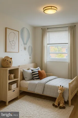 a bedroom with a bed and window