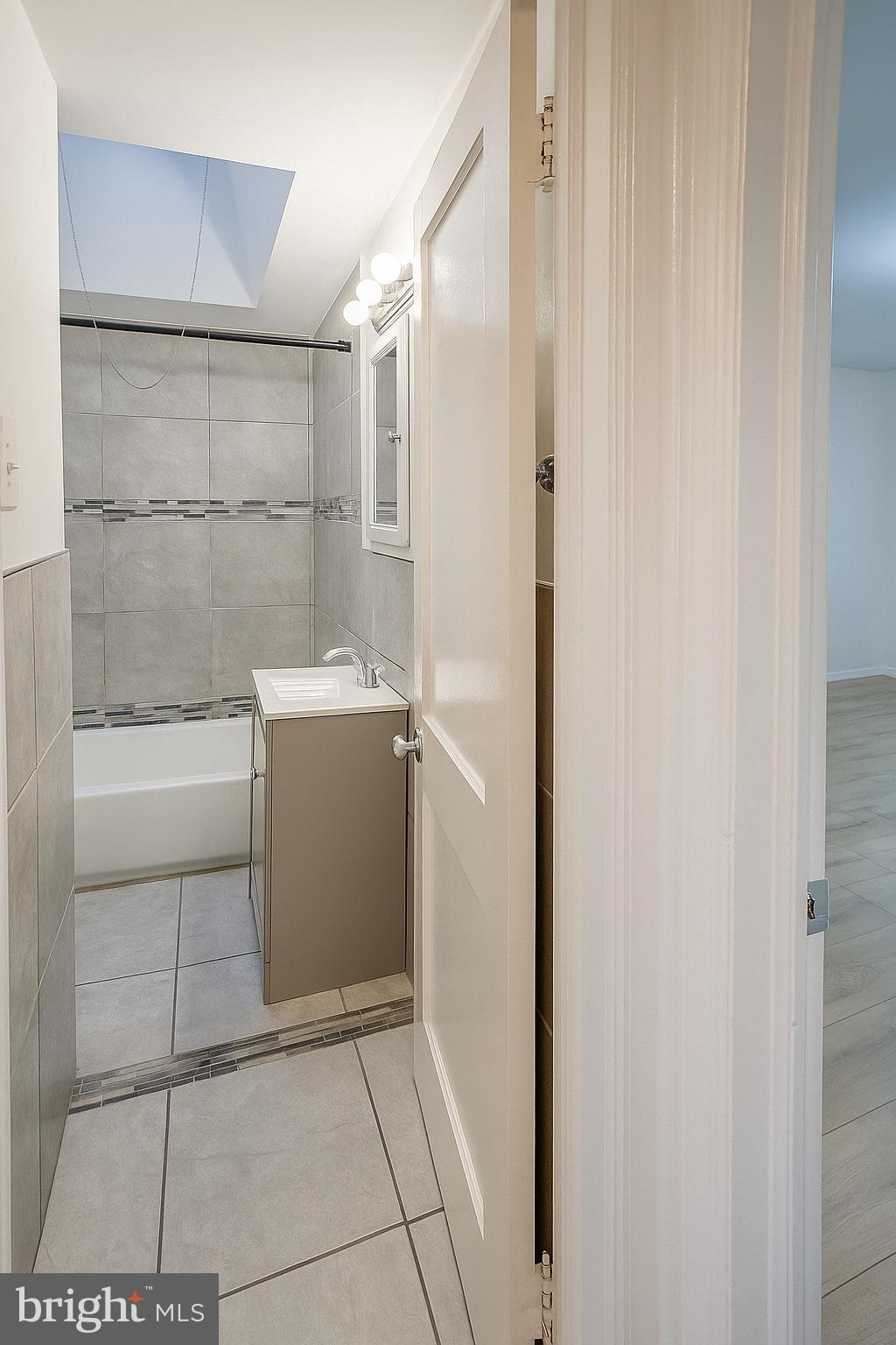 753 Bennington Road Folcroft, PA 19032 - Photo 20 of 25 a bathroom with a shower and a sink