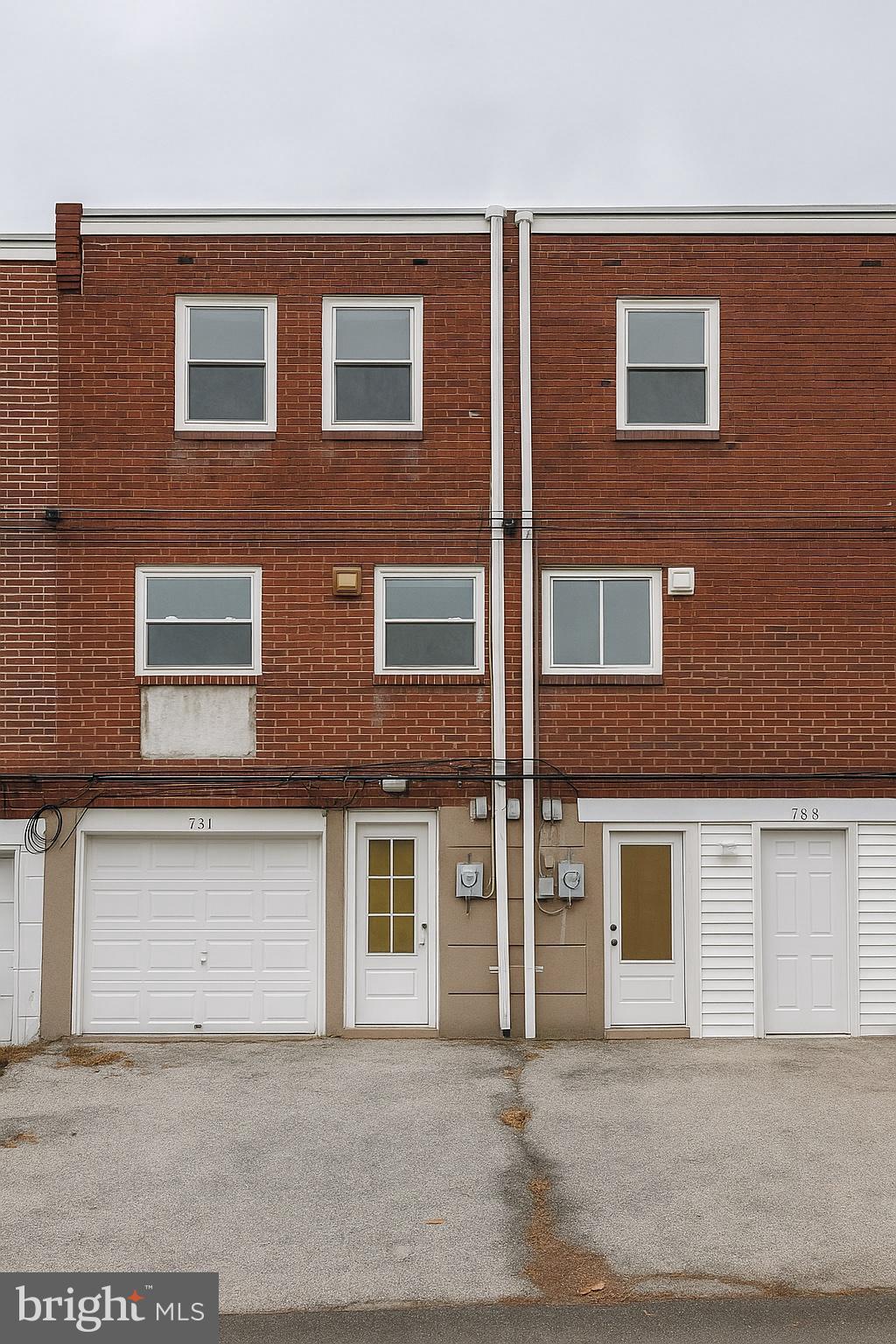 753 Bennington Road Folcroft, PA 19032 - Photo 25 of 25 a building view with a brick wall