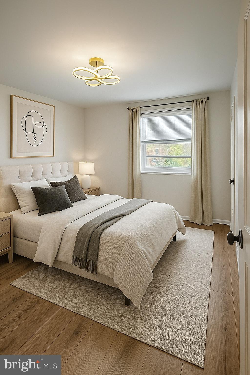 753 Bennington Road Folcroft, PA 19032 - Photo 10 of 25 a bedroom with a bed and a night stand