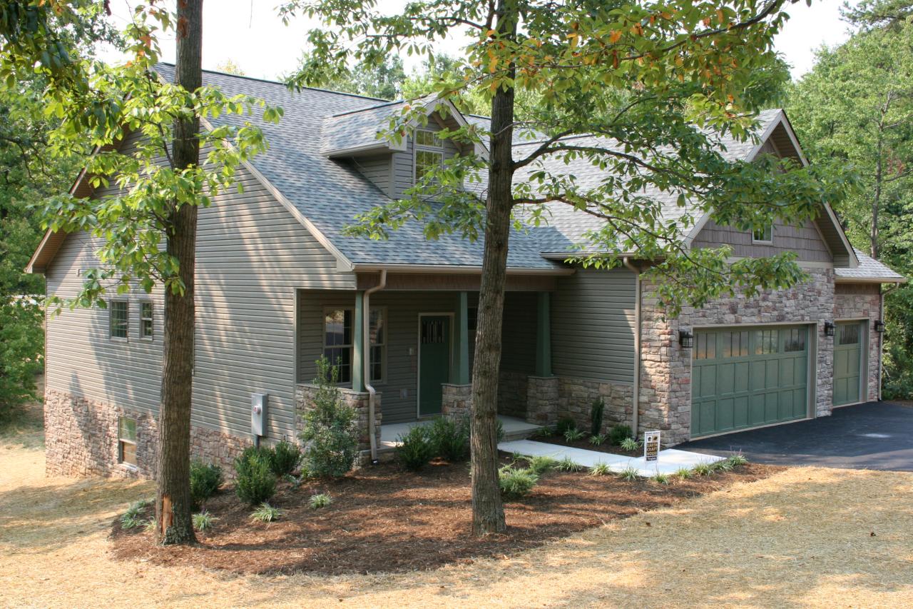 91 Stonehaven Lane Blue Ridge, VA 24064 - Photo 1 of 52 a view of a house with a tree in front