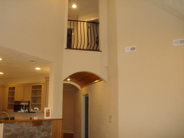 91 Stonehaven Lane Blue Ridge, VA 24064 - Photo 13 of 52 a hallway with sliding door and wooden floor
