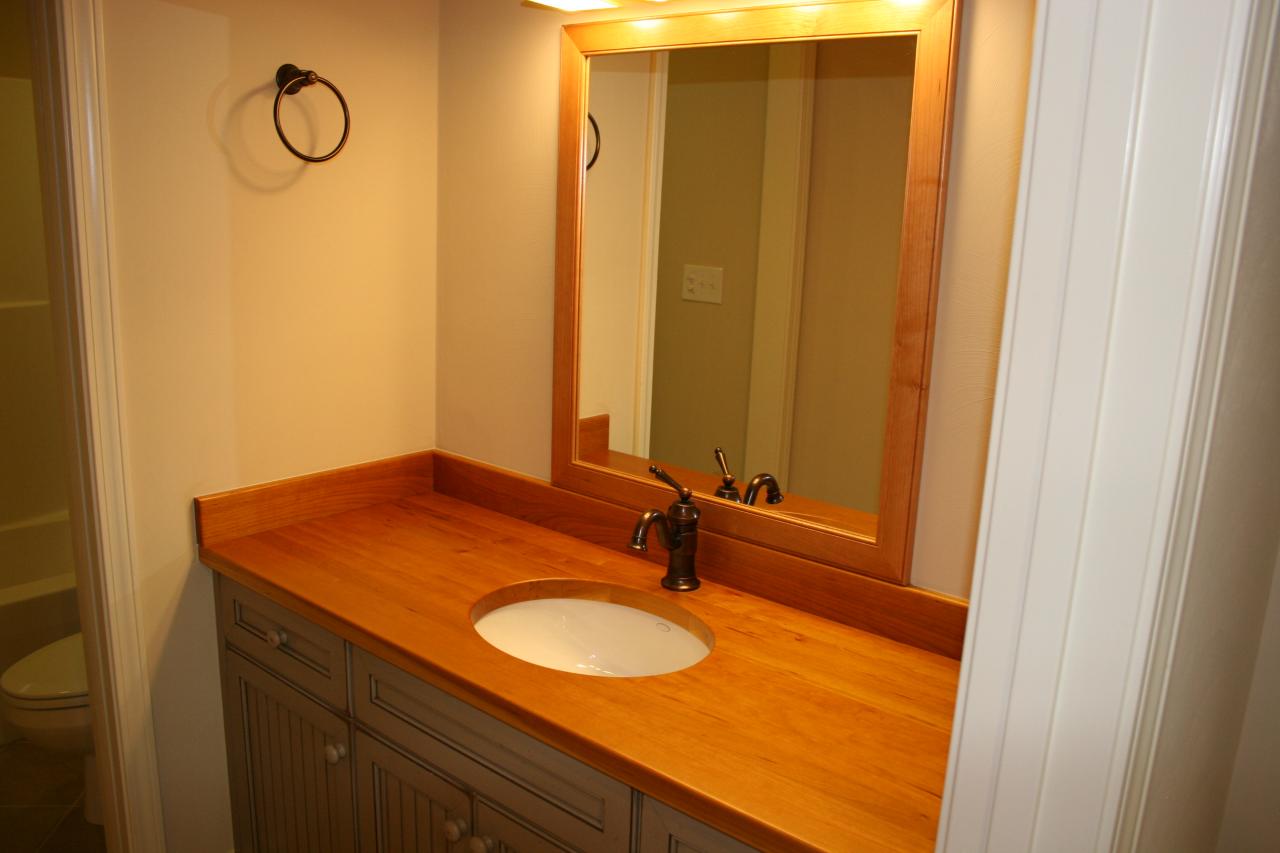 91 Stonehaven Lane Blue Ridge, VA 24064 - Photo 27 of 52 a bathroom with a granite countertop sink and a mirror