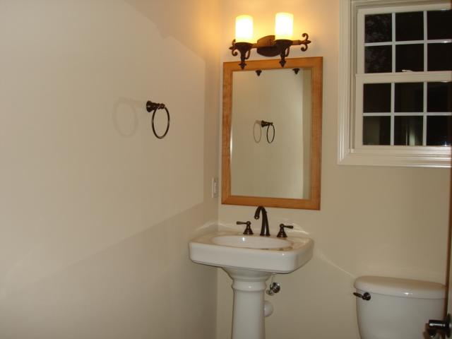 91 Stonehaven Lane Blue Ridge, VA 24064 - Photo 36 of 52 a bathroom with a sink and mirror