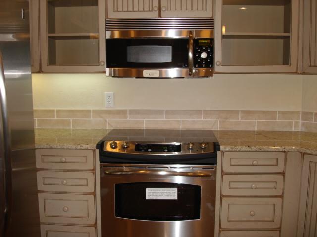 91 Stonehaven Lane Blue Ridge, VA 24064 - Photo 5 of 52 a stove top oven sitting inside of a kitchen