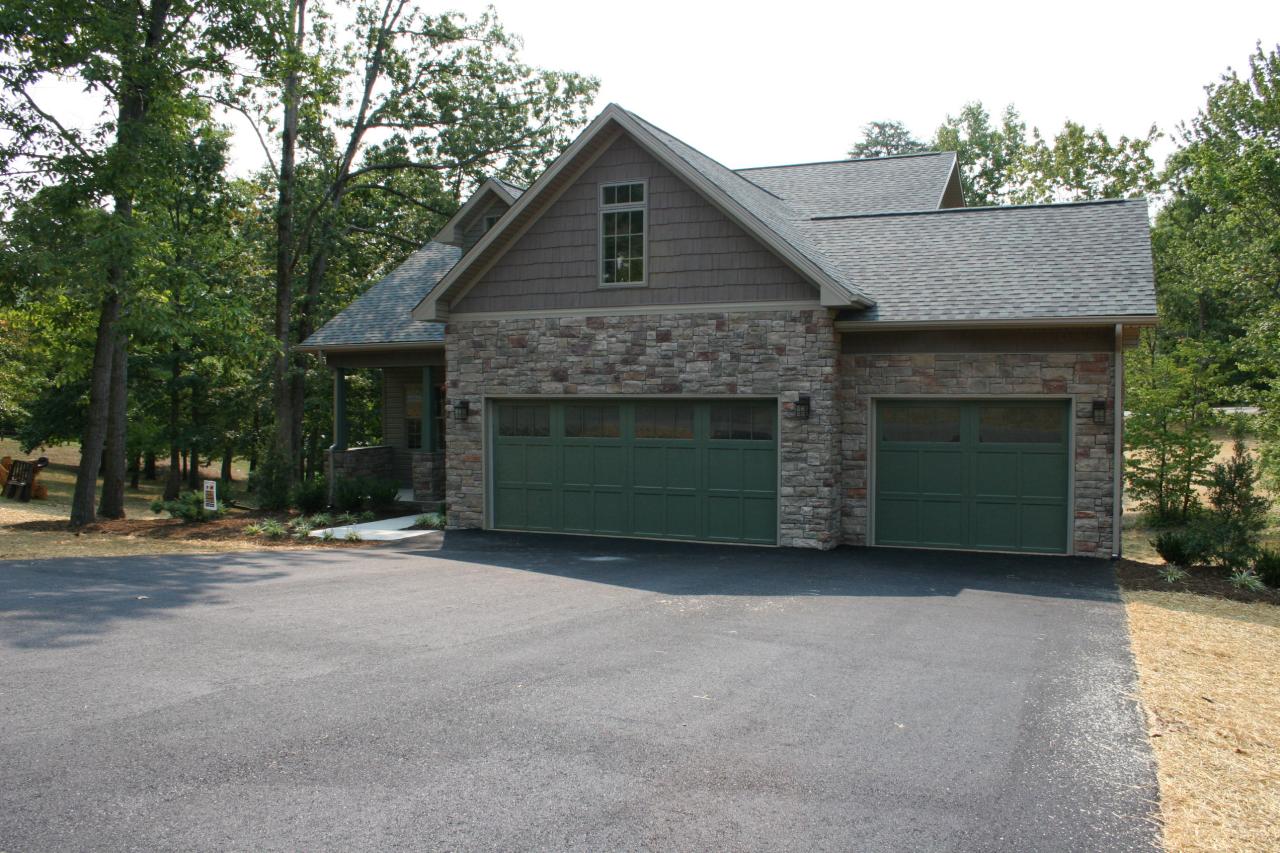 91 Stonehaven Lane Blue Ridge, VA 24064 - Photo 50 of 52 a front view of a house with yard and trees