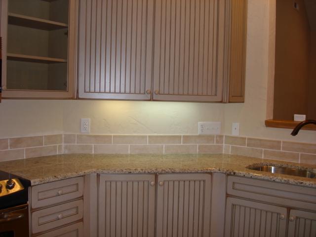 91 Stonehaven Lane Blue Ridge, VA 24064 - Photo 6 of 52 a kitchen with granite countertop a sink a stove and cabinets
