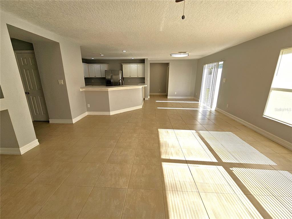 Undisclosed Address Orlando, FL 32818 - Photo 12 of 26 a view of a kitchen with a sink and a window