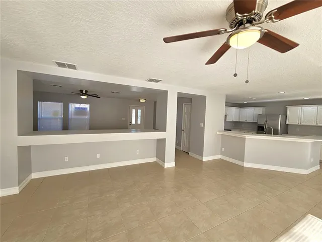 a view of a kitchen with a sink