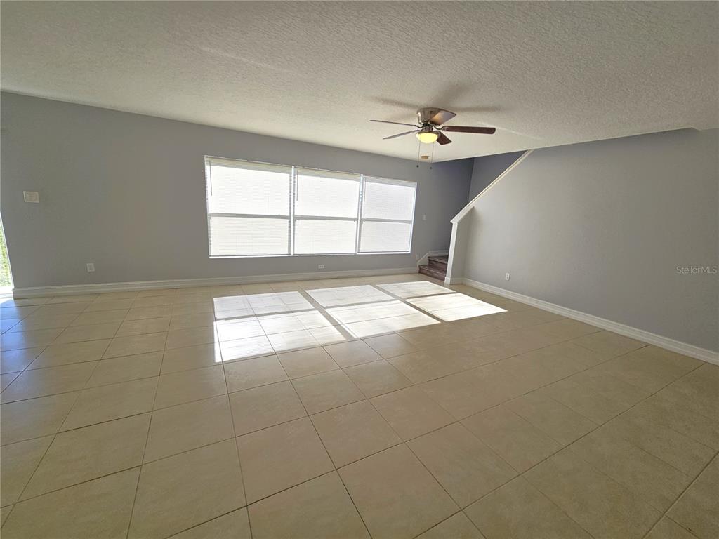 Undisclosed Address Orlando, FL 32818 - Photo 6 of 26 a view of an empty room with a window