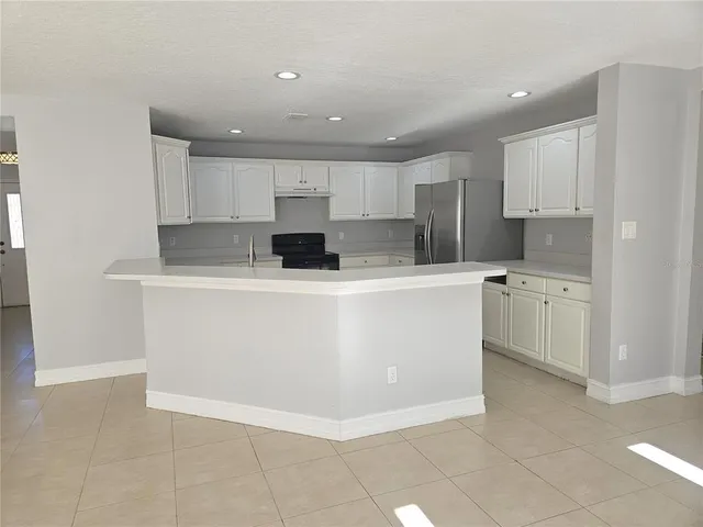 a view of kitchen with stainless steel appliances