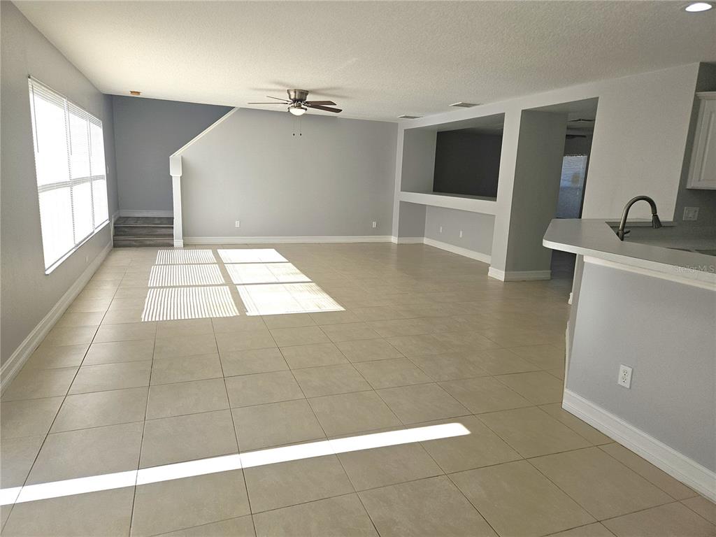 Undisclosed Address Orlando, FL 32818 - Photo 9 of 26 a view of an empty room with a window