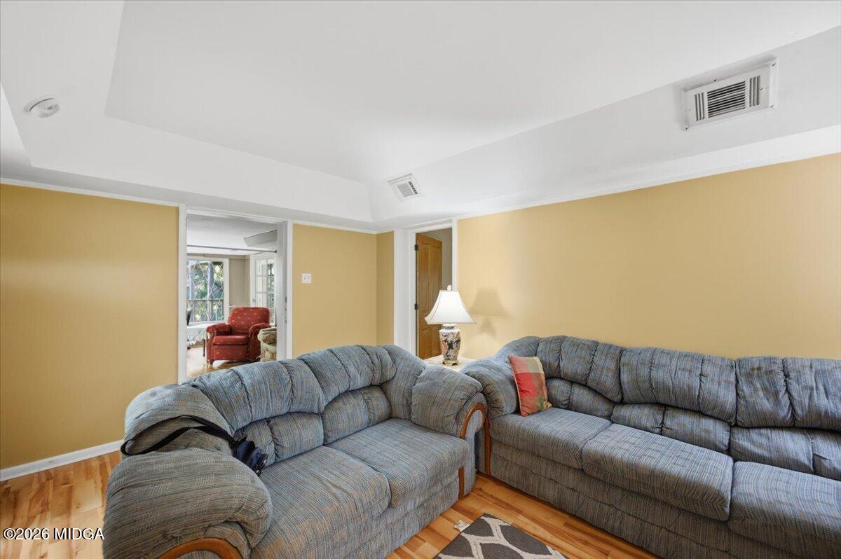 1019 Bond Street Macon, GA 31201 - Photo 32 of 56 a living room with a couch