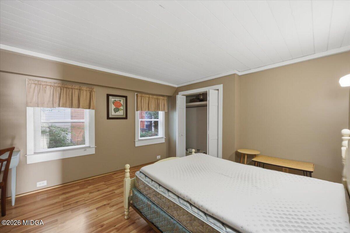 1019 Bond Street Macon, GA 31201 - Photo 34 of 56 a bedroom with a bed and a window