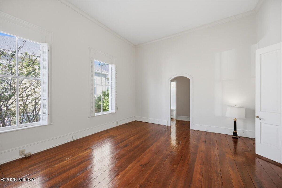 1019 Bond Street Macon, GA 31201 - Photo 37 of 56 a view of room with window and wooden floor