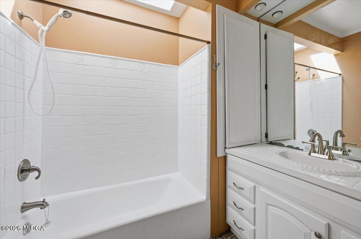 1019 Bond Street Macon, GA 31201 - Photo 39 of 56 a bathroom with a bathtub and a sink