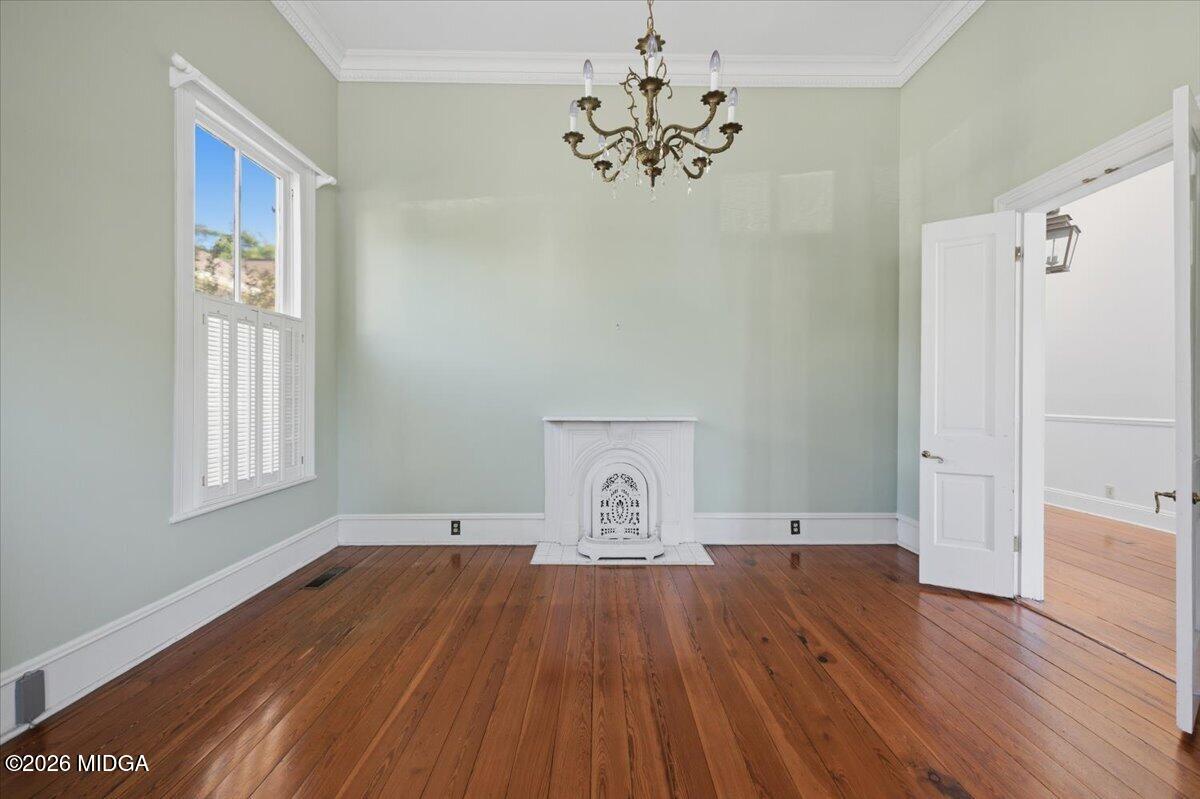 1019 Bond Street Macon, GA 31201 - Photo 4 of 56 a view of a room with wooden floor and window