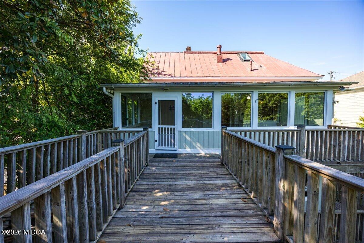 1019 Bond Street Macon, GA 31201 - Photo 52 of 56 a view of a deck with wooden floor and fence