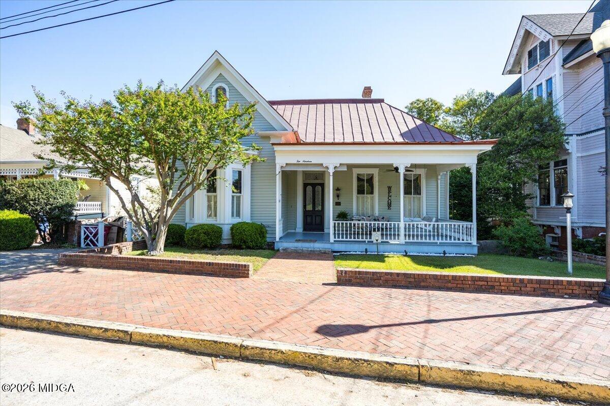 1019 Bond Street Macon, GA 31201 - Photo 53 of 56 a view of a house with garden and large tree