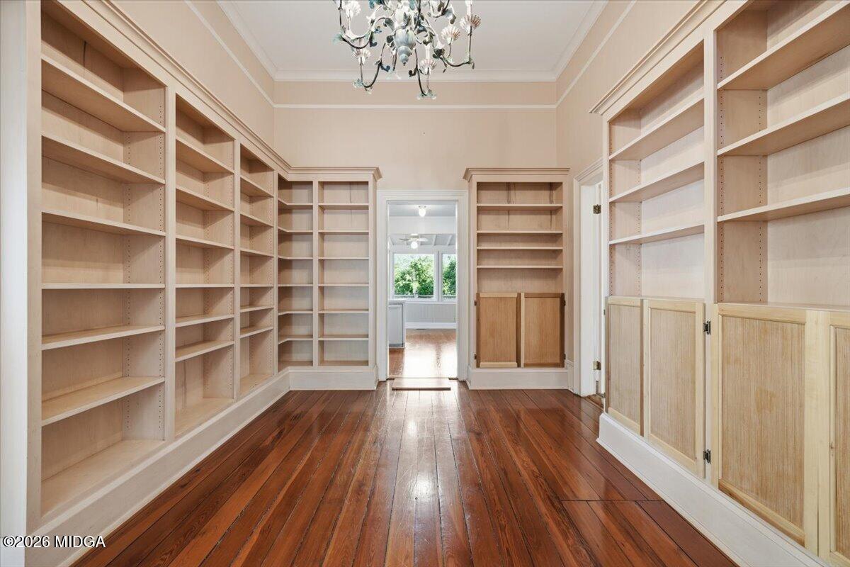1019 Bond Street Macon, GA 31201 - Photo 7 of 56 a view of an empty room with a window and wooden floor
