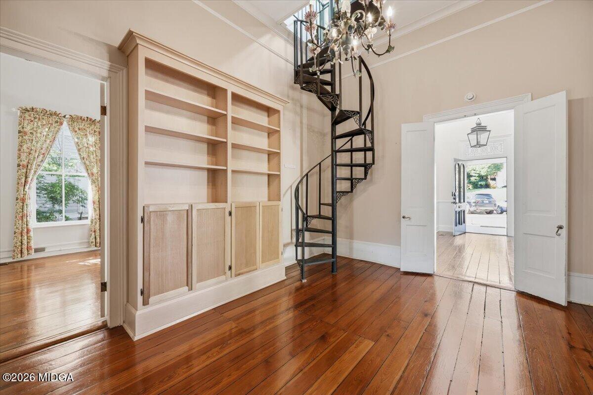 1019 Bond Street Macon, GA 31201 - Photo 8 of 56 a view of empty room with wooden floor and fan