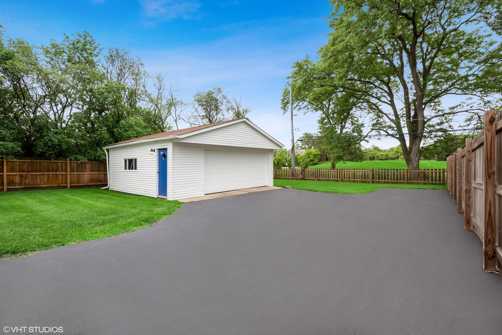 810 Shermer Road Glenview, IL 60025 - Photo 17 of 22 a view of a house with a yard and garage