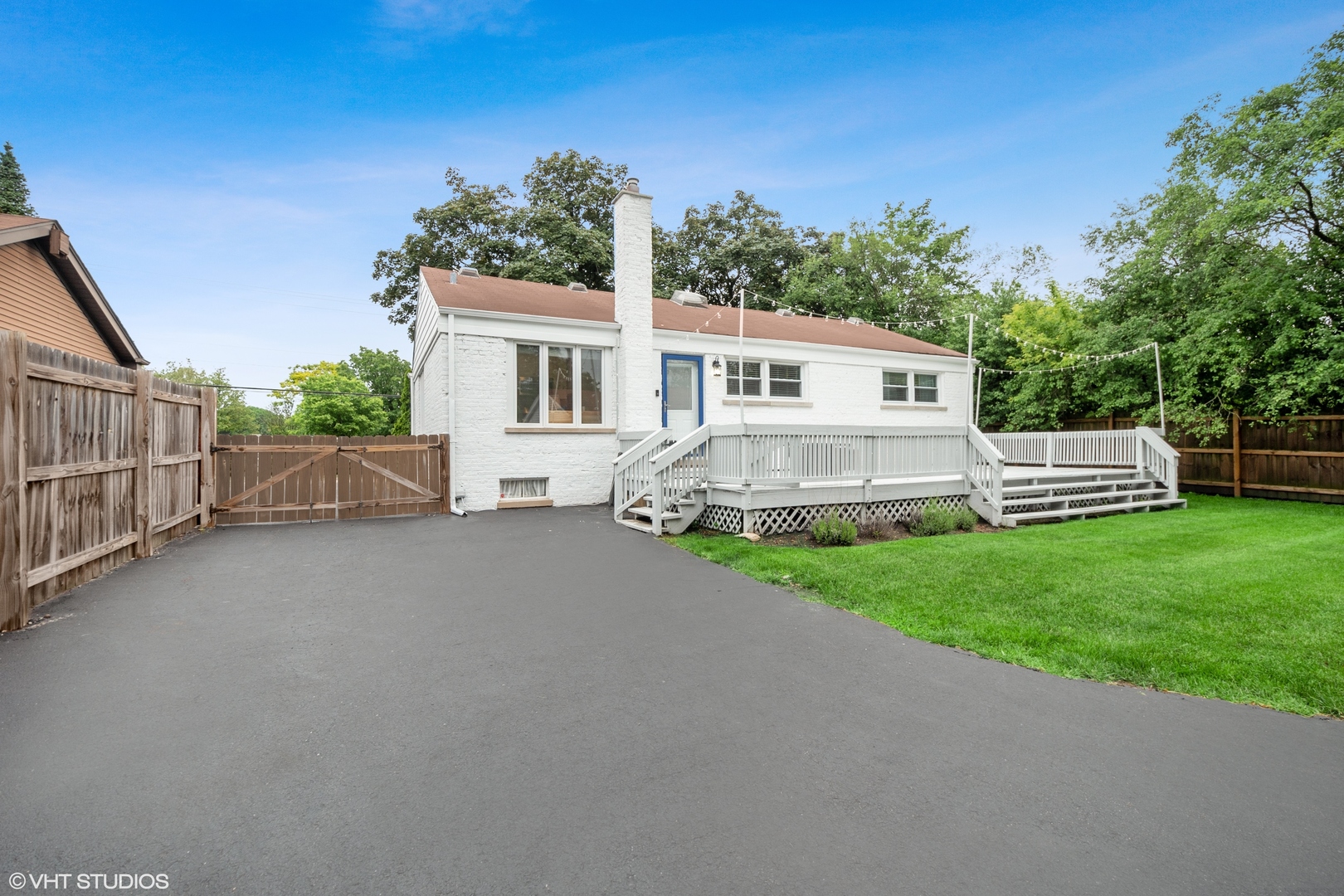 810 Shermer Road Glenview, IL 60025 - Photo 19 of 22 a view of a house with a yard and potted plants