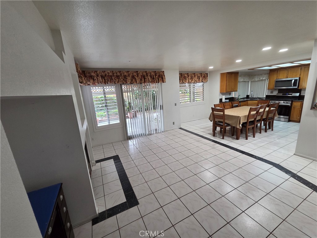1669 West Victoria Street Rialto, CA 92376 - Photo 19 of 22 a bedroom with furniture and a large window
