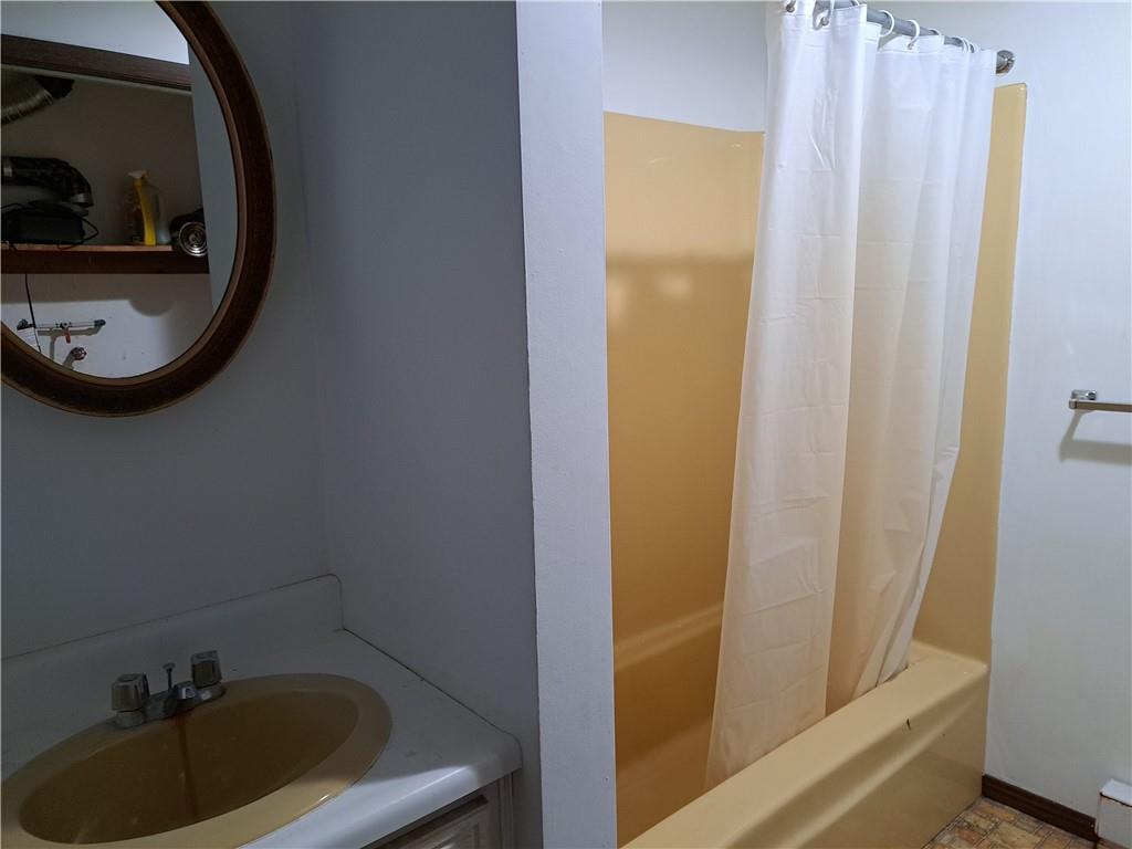 1100 Rte 119 Highway North Indiana, PA 15701 - Photo 17 of 20 a bathroom with a sink and a mirror