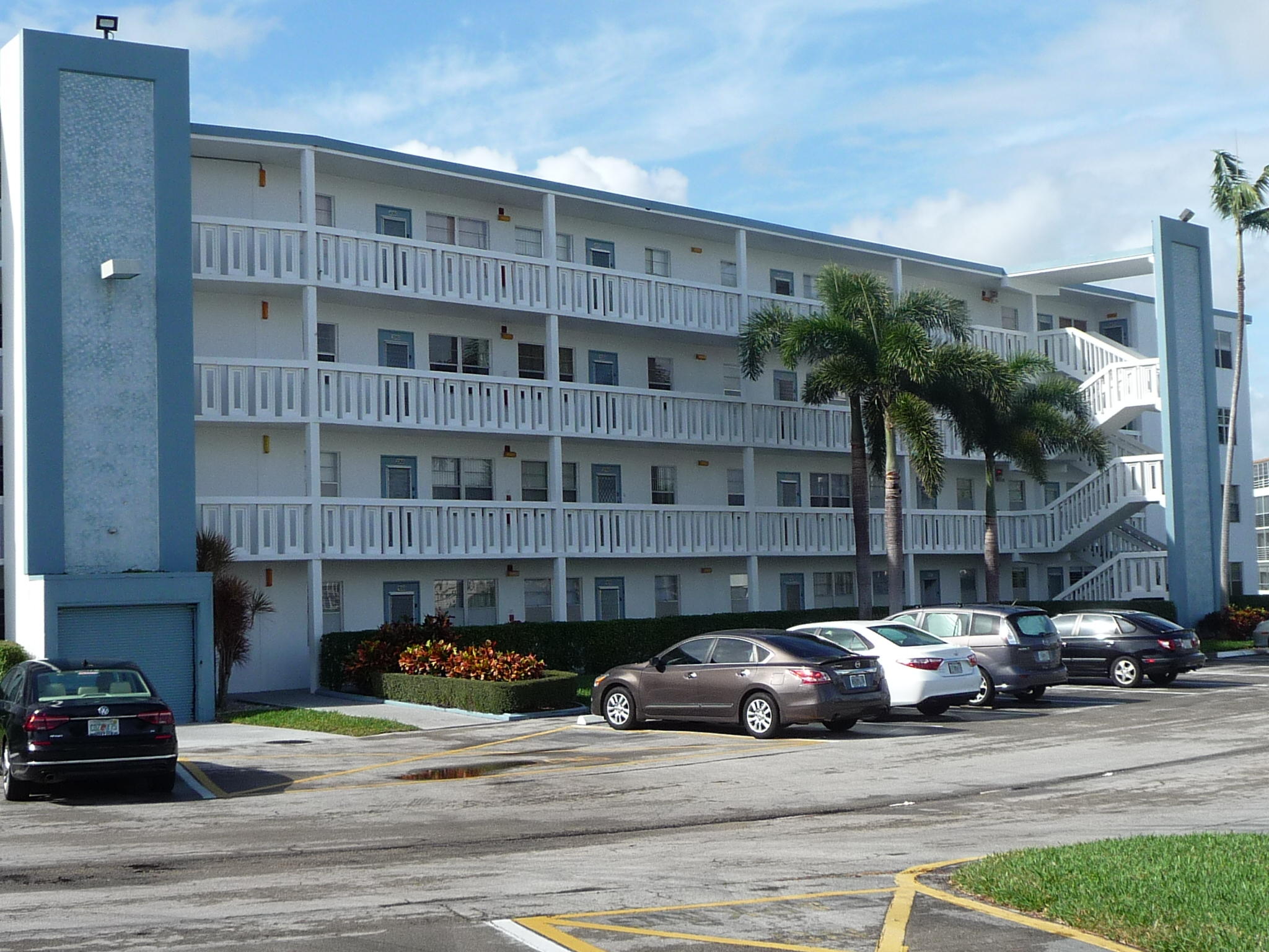 a view of a cars parked in front of a building