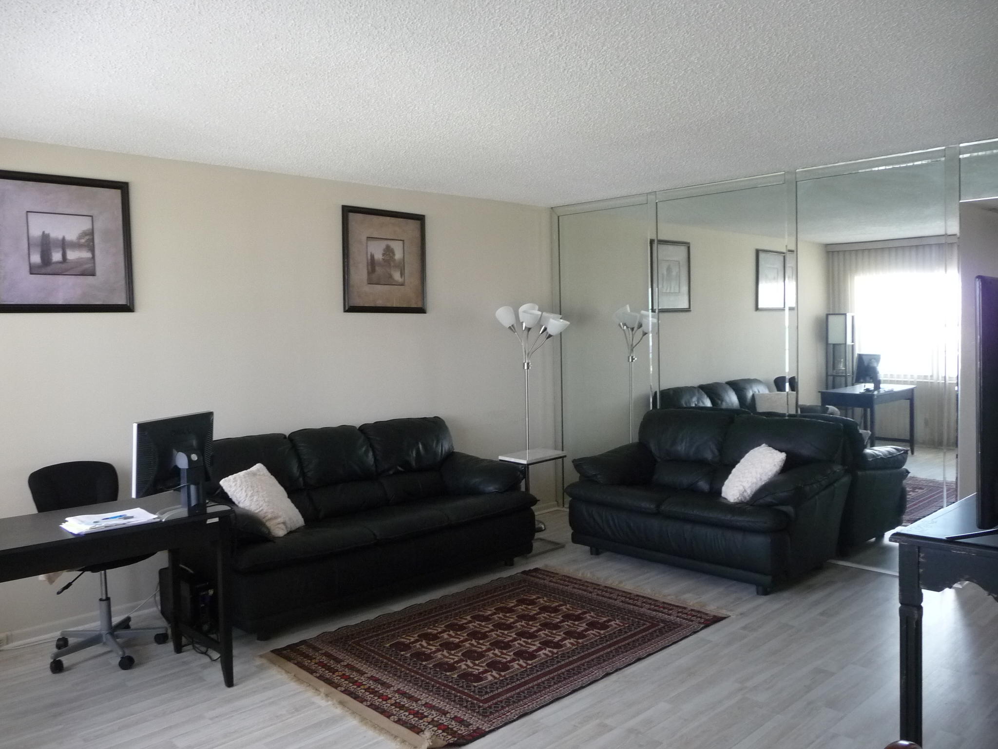 4057 Exeter Boca Raton, FL 33434 - Photo 2 of 10 a living room with furniture and a rug
