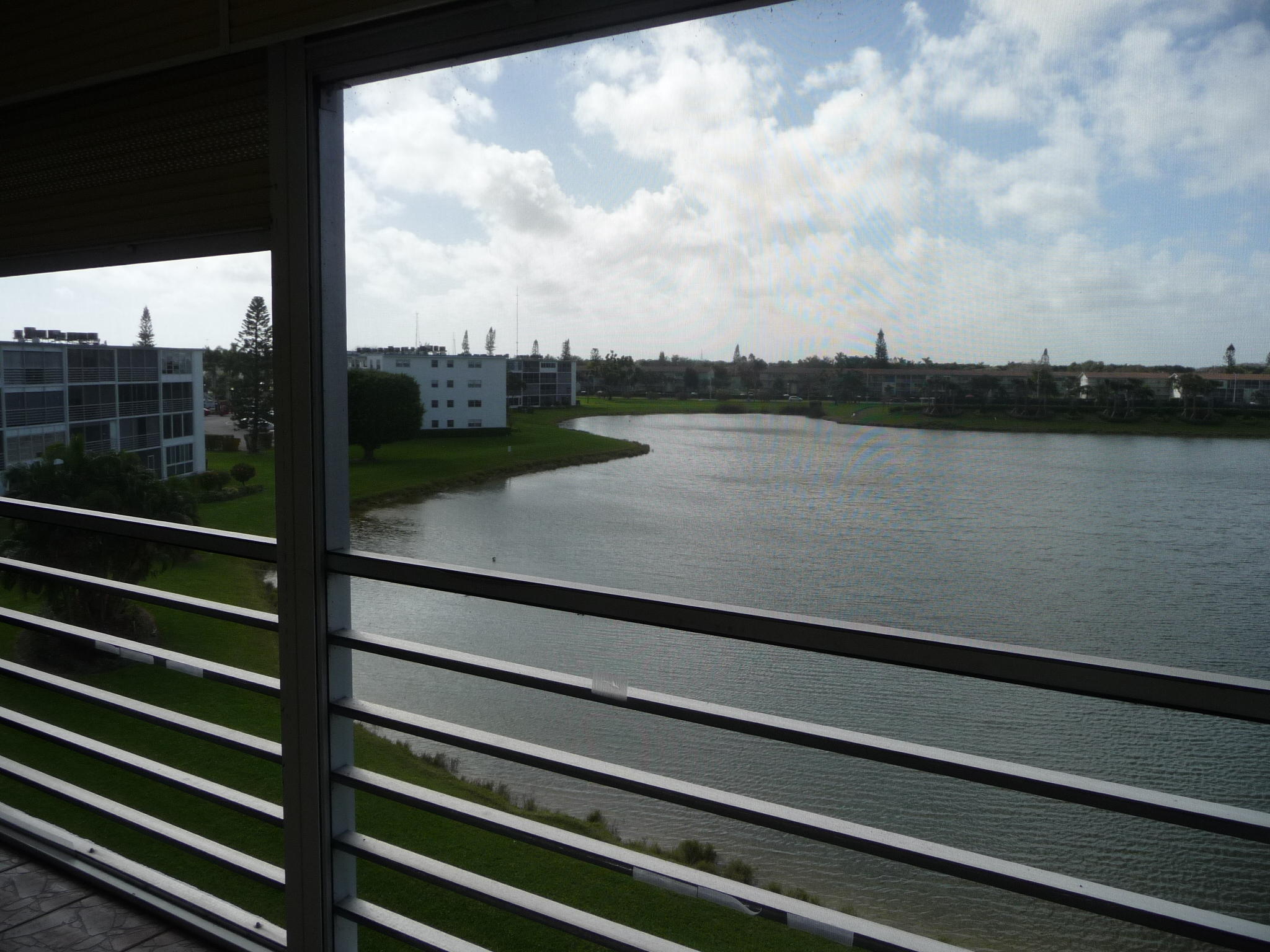 4057 Exeter Boca Raton, FL 33434 - Photo 8 of 10 a view of swimming pool from balcony