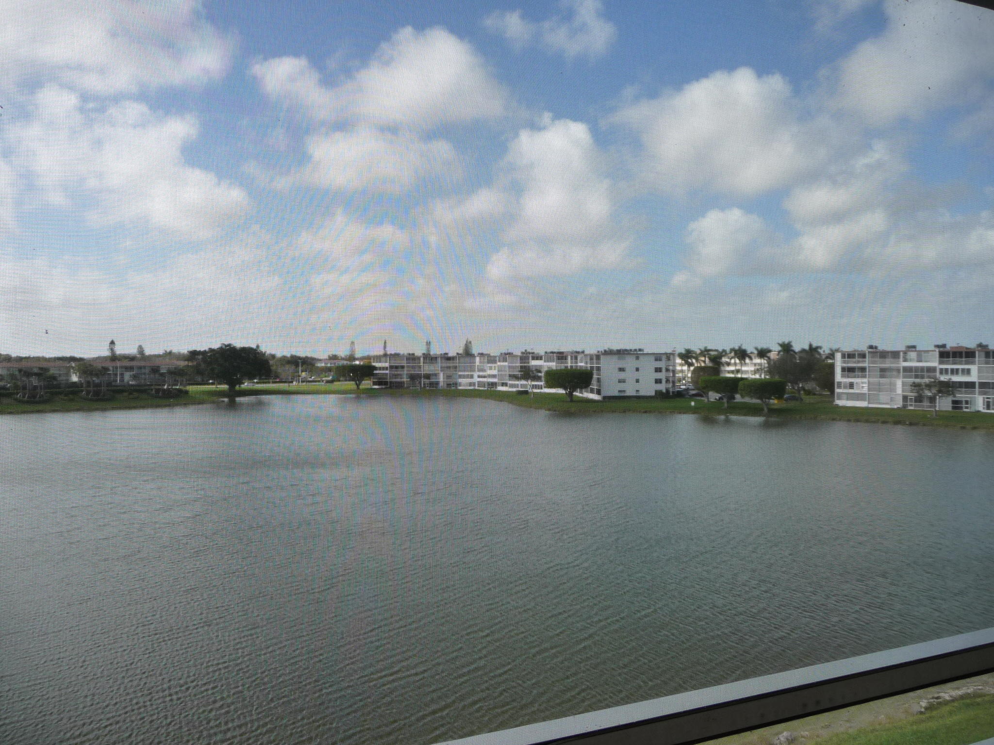 4057 Exeter Boca Raton, FL 33434 - Photo 9 of 10 a view of a lake view