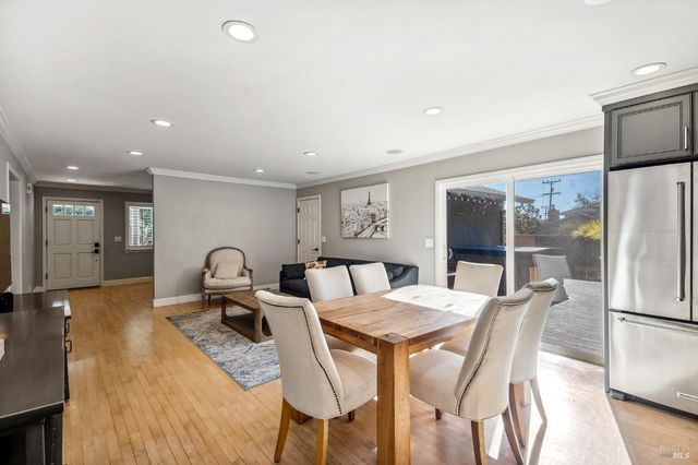 a view of a dining room with furniture