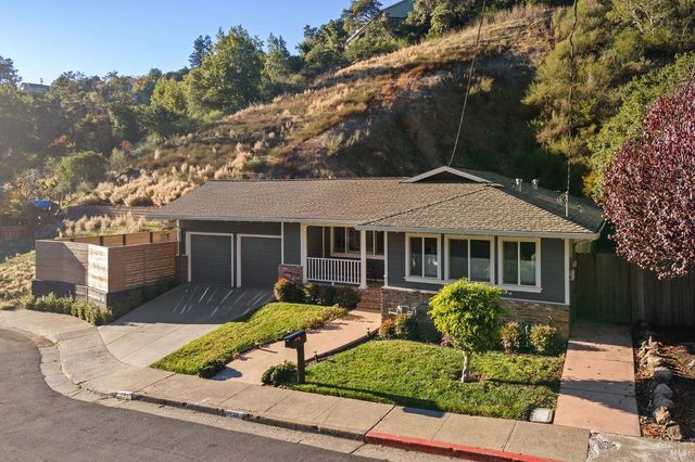 front view of a house with yard
