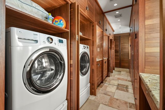 a utility room with dryer and washer