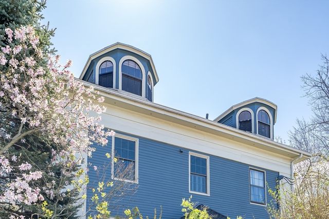 a view of a house with a roof deck