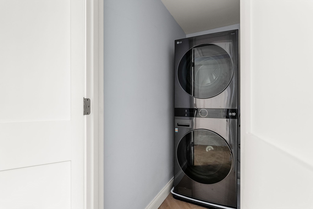 771 Harrison Avenue, Unit 206 Boston, MA 02118 - Photo 13 of 22 a close up view of a washer and dryer