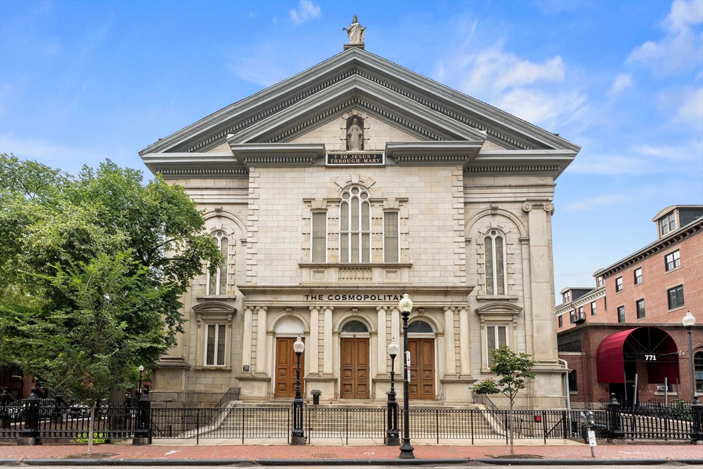 771 Harrison Avenue, Unit 206 Boston, MA 02118 - Photo 20 of 22 a front view of a house with a yard