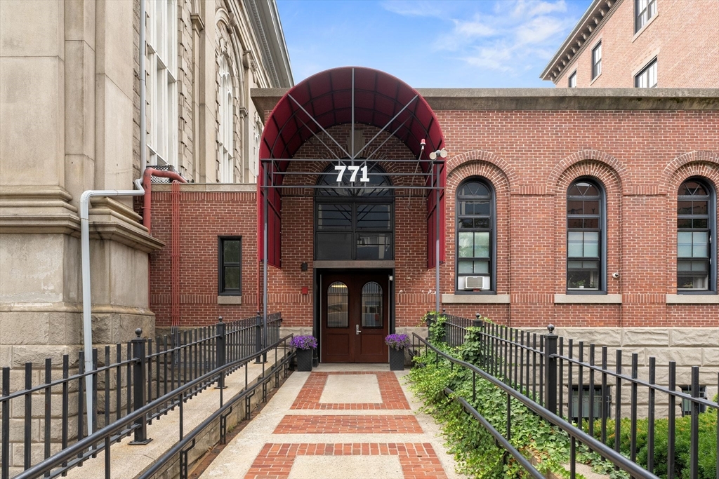 771 Harrison Avenue, Unit 206 Boston, MA 02118 - Photo 21 of 22 a front view of a house with glass windows