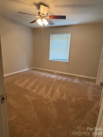 a view of a room with a fan