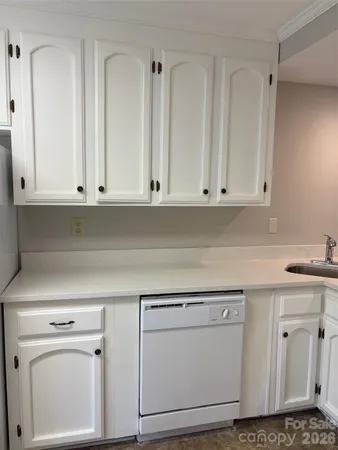 a view of cabinets with granite countertop cabinets