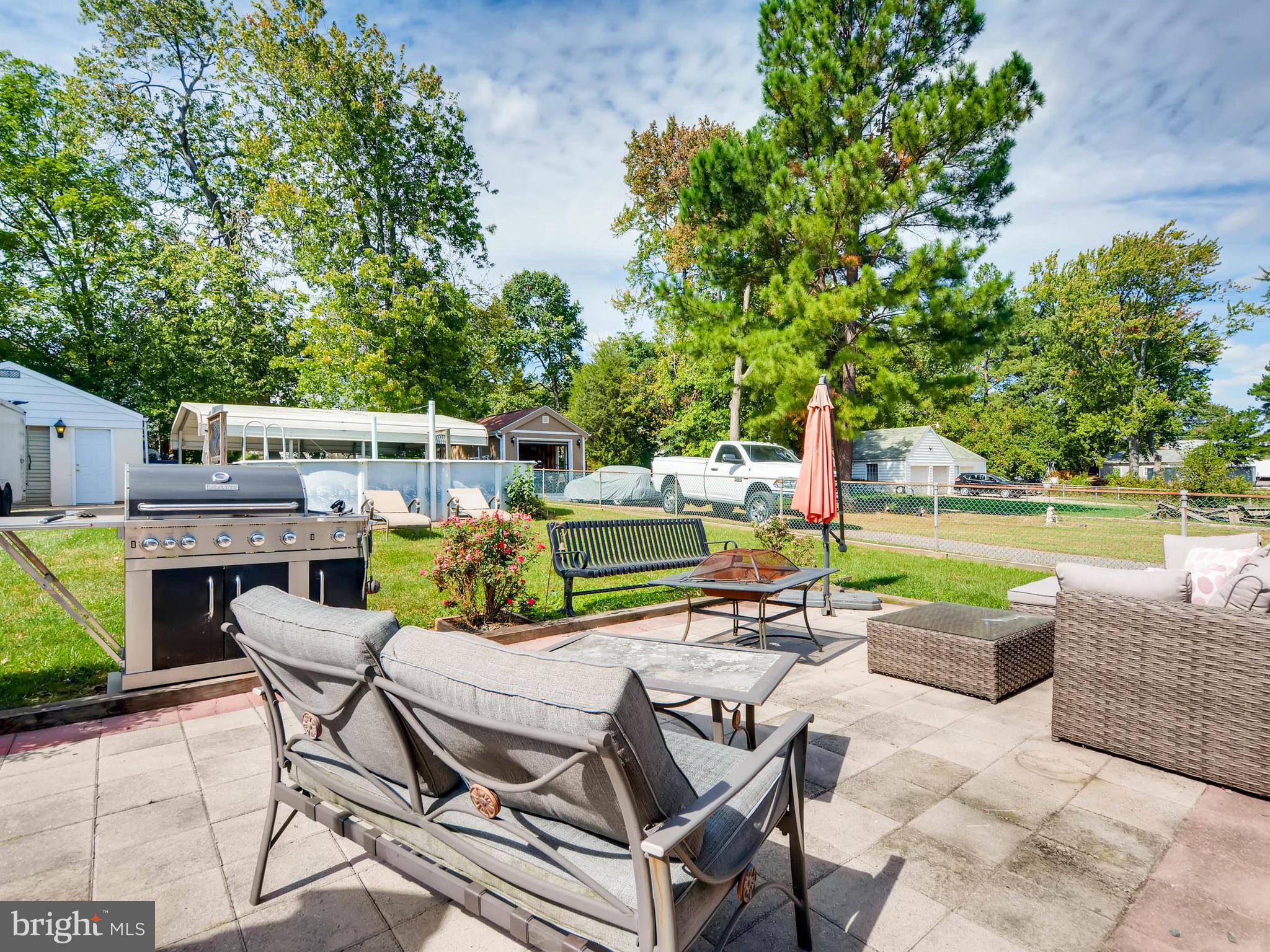5913 Meadow Road Baltimore, MD 21206 - Photo 22 of 28 Large back yard with patio and pool