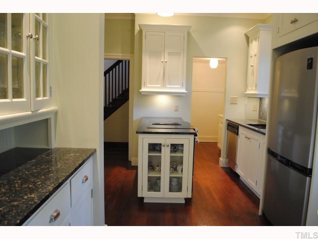 117 Pinecrest Road Durham, NC 27705 - Photo 3 of 12 Custom cabinetry, granite countertops and stainless steel appliances