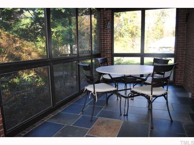 117 Pinecrest Road Durham, NC 27705 - Photo 5 of 12 Slate Floors/ glass windows may be removed to enjoy the temperate months with screen.
