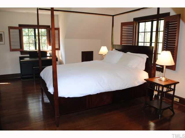 117 Pinecrest Road Durham, NC 27705 - Photo 6 of 12 Charming dormers and beautiful plantation shutters create a beautiful space in this master bedroom