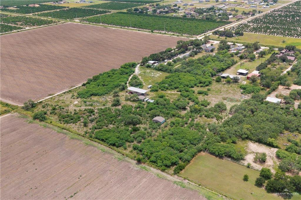 0 Mile 10 1/2 Road North Donna, TX 78537 - Photo 8 of 11 an aerial view of a residential houses with outdoor space and street view